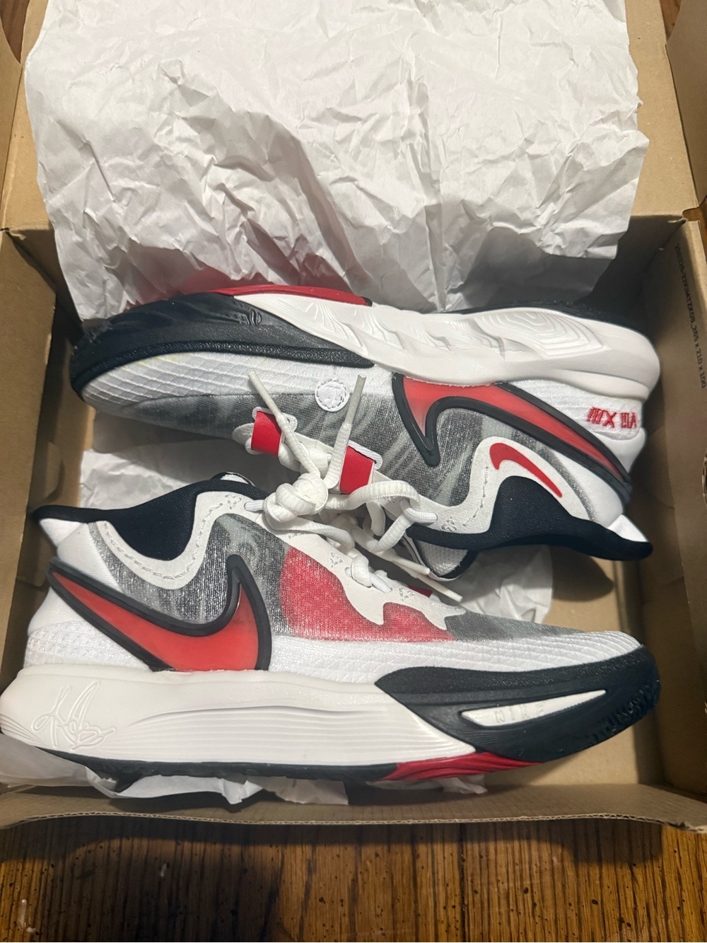 Nike Kids' White, Red Kyrie Irving shoes